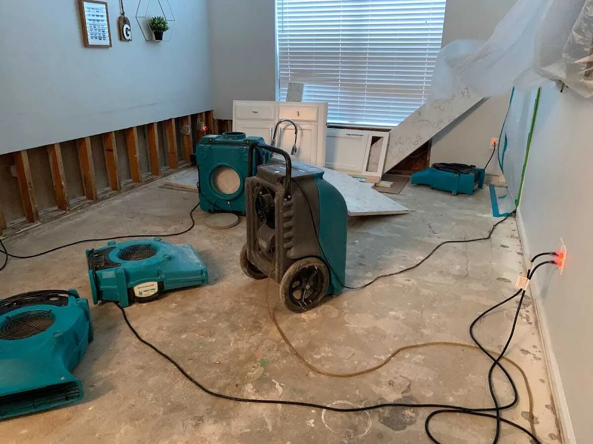 Dehumidifier in flood-cut room for Water Damage Restoration in Schuyler